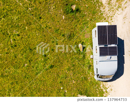 Caravan solar panels on roof camping on nature. Aerial view Caravan solar panels on roof camping on nature. Aerial view 137964733