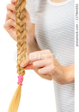 Blonde female with braid hair Blonde female with braid hair 137964892