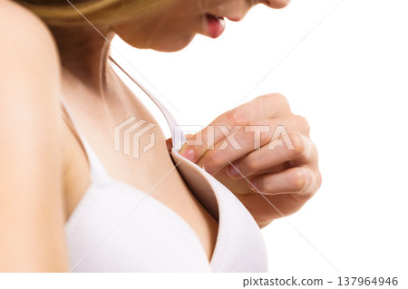 Female wearing too big bra Female wearing too big bra 137964946
