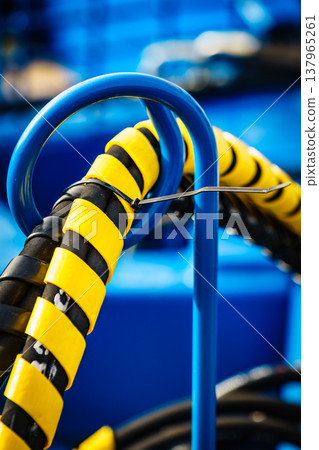 Hydraulic connections hoses in spiral wrap Hydraulic connections hoses in spiral wrap 137965261