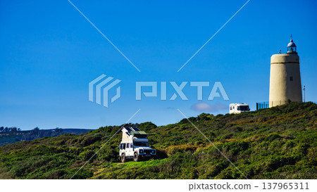 Caravan on spanish coast, Gibraltar rock on horizon Caravan on spanish coast, Gibraltar rock on horizon 137965311