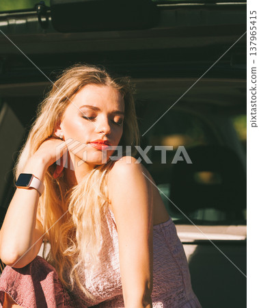 Woman enjoying sunlight 137965415