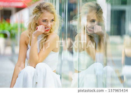 Fashionable woman in city Fashionable woman in city 137965434