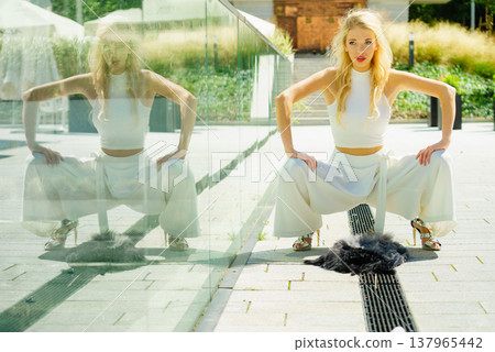 Woman wearing crop top and culottes 137965442