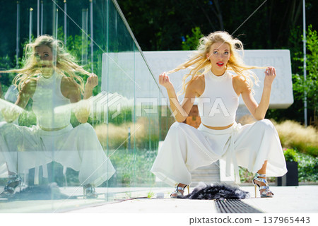 Woman wearing crop top and culottes 137965443