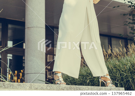 Woman wearing high heels and culottes 137965462