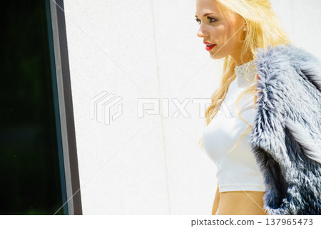 Fashionable woman in city Fashionable woman in city 137965473