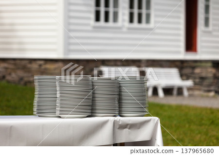 Big piles of fresh clean plates 137965680
