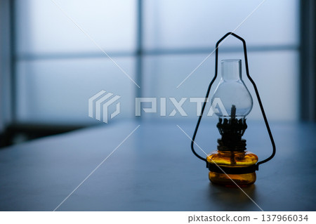 A lantern placed by the window A lantern placed by the window 137966034