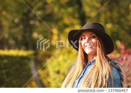 Cheerful woman having fun outdoors Cheerful woman having fun outdoors 137966467