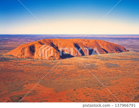 Aerial view of Uluru (Ayers Rock), the world's largest monolith. Aerial view of Uluru (Ayers Rock), the world's largest monolith. 137966791