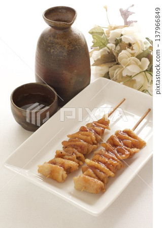 Grilled chicken skin and sake Grilled chicken skin and sake 137966849