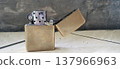 Antique Brass Lighter on Marble Surface 137966963
