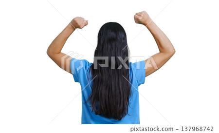 Woman with her back turned raising fists celebrating success and winning Woman with her back turned raising fists celebrating success and winning 137968742