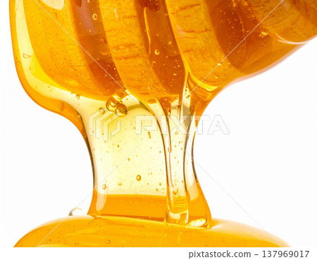 Rich, golden-colored honey Rich, golden-colored honey 137969017