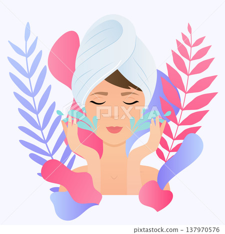 Young woman in towel with clean fresh skin touch own face. 137970576