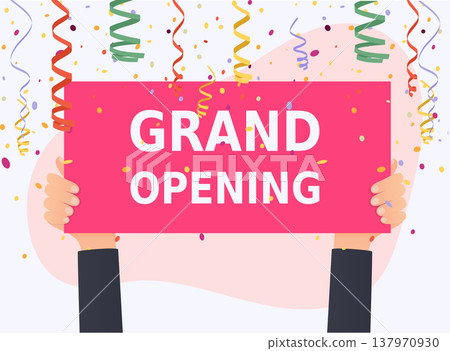 Hand holding the GRAND OPENING banner. Colorful confetti on white background. 137970930