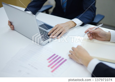 Businessmen in the meeting Businessmen in the meeting 137971074