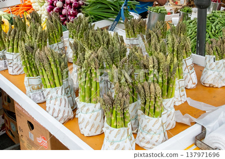 Fresh asparagus on display in a market in Finland, Northern Europe. Fresh asparagus on display in a market in Finland, Northern Europe. 137971696