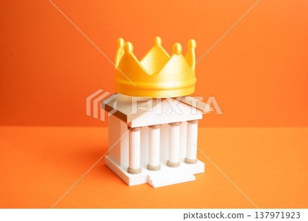 A bank with a golden crown on its roof. The best bank and market leader. Financial strength and reputation attract investors while stability and trust define success in the banking sector. A bank with a golden crown on its roof. The best bank and market leader. Financial strength and reputation attract investors while stability and trust define success in the banking sector. 137971923