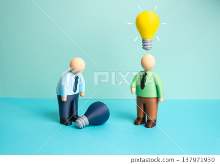 Two office workers, one with an idea and one without. Initiative and a desire to work. Creativity and professional motivation. Persistence in business and the importance of innovative thinking. 137971930