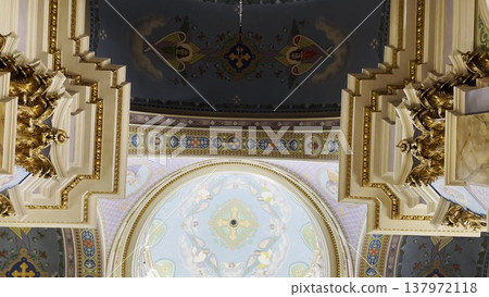 Interior view of a beautiful church showcasing ornate architecture, high ceilings and detailed decorations. Sacred space emphasizing the atmosphere of peace, spirituality and historical character Interior view of a beautiful church showcasing ornate architecture, high ceilings and detailed decorations. Sacred space emphasizing the atmosphere of peace, spirituality and historical character 137972118