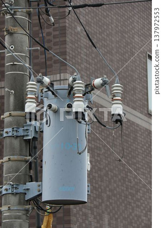 Pole-mounted transformer 137972553