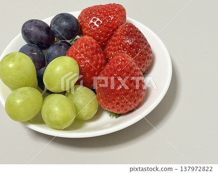 Fruit platter: Strawberries and grapes Fruit platter: Strawberries and grapes 137972822