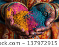 colorful powder on the hand 137972915