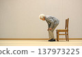 Elderly people sitting in a chair 137973225