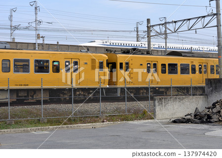 115 series "bread loaf" train, currently stored at the train depot after being taken out of service. 137974420
