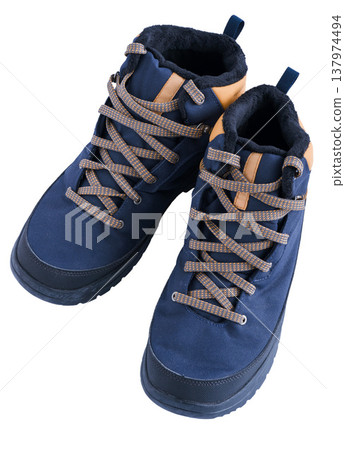 Trekking boots for hiking isolated on a white background. Pair shoes top view Trekking boots for hiking isolated on a white background. Pair shoes top view 137974494