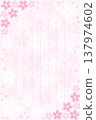 An elegant illustration of cherry blossoms fluttering in the air on a vertically written notepaper (7 lines, dotted lines, spring greeting card, Japanese style). 137974602