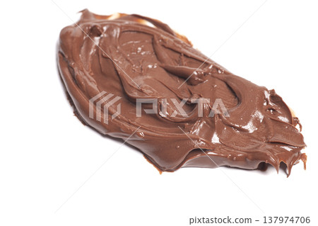 Smear of chocolate nut paste isolated on white. 137974706