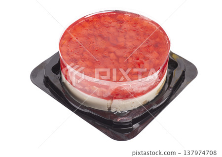 Cheesecake topped with strawberries isolated on white background 137974708