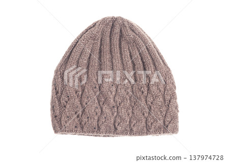 Knitted brown winter hat isolated on white background. Knitted brown winter hat isolated on white background. 137974728