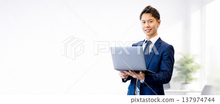 Male businessman with laptop Male businessman with laptop 137974744
