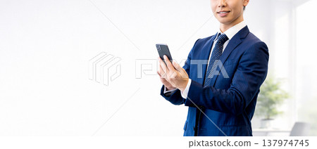 Male businessmen with smartphones 137974745