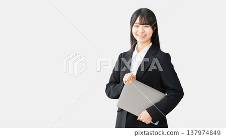 Woman with a laptop / business woman Woman with a laptop / business woman 137974849