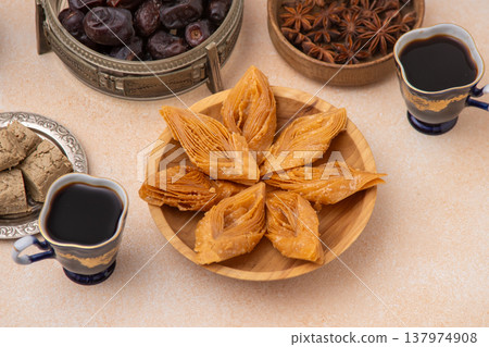 Coffee drink in vintage blue cups with sweets. Food background 137974908