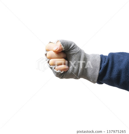 a male hand with a fingerless woolen glove a male hand with a fingerless woolen glove 137975265