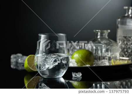 Vodka in a glass with ice. 137975793
