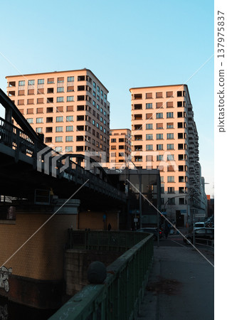 Modern Residential Buildings and Bridge in Evening City Light Modern Residential Buildings and Bridge in Evening City Light 137975837