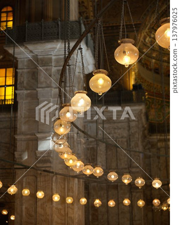 Hanging lamps and curves of light inside the Mohammed Ali Mosque in Cairo's Saladin Fortress 137976025