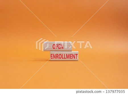 Open Enrollment symbol. Wooden blocks with words Open Enrollment. Beautiful orange background. Business and Open Enrollment concept. Copy space. Open Enrollment symbol. Wooden blocks with words Open Enrollment. Beautiful orange background. Business and Open Enrollment concept. Copy space. 137977035