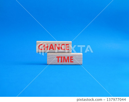 Chance Time symbol. Wooden blocks with words Chance Time. Beautiful blue background. Health and Chance Time concept. Copy space. Chance Time symbol. Wooden blocks with words Chance Time. Beautiful blue background. Health and Chance Time concept. Copy space. 137977044