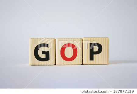 GOP - Gross Operating Profit symbol. Concept word GOP on wooden cubes. Beautiful white background. Business and GOP concept. Copy space. GOP - Gross Operating Profit symbol. Concept word GOP on wooden cubes. Beautiful white background. Business and GOP concept. Copy space. 137977129