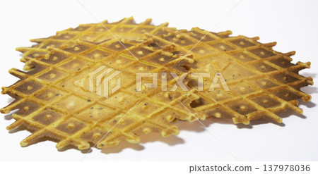 Pizzelles on white background. Side view. Isolated 137978036