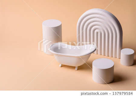 A beige background with a white bath and a podium for items with copy space. A beige background A beige background with a white bath and a podium for items with copy space. A beige background 137979584