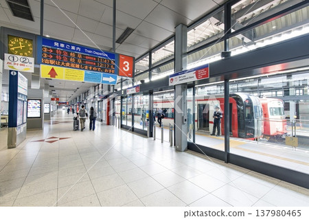 A Meitetsu train stopped at the platform of Chubu Centrair International Airport Station in Tokoname City. A Meitetsu train stopped at the platform of Chubu Centrair International Airport Station in Tokoname City. 137980465